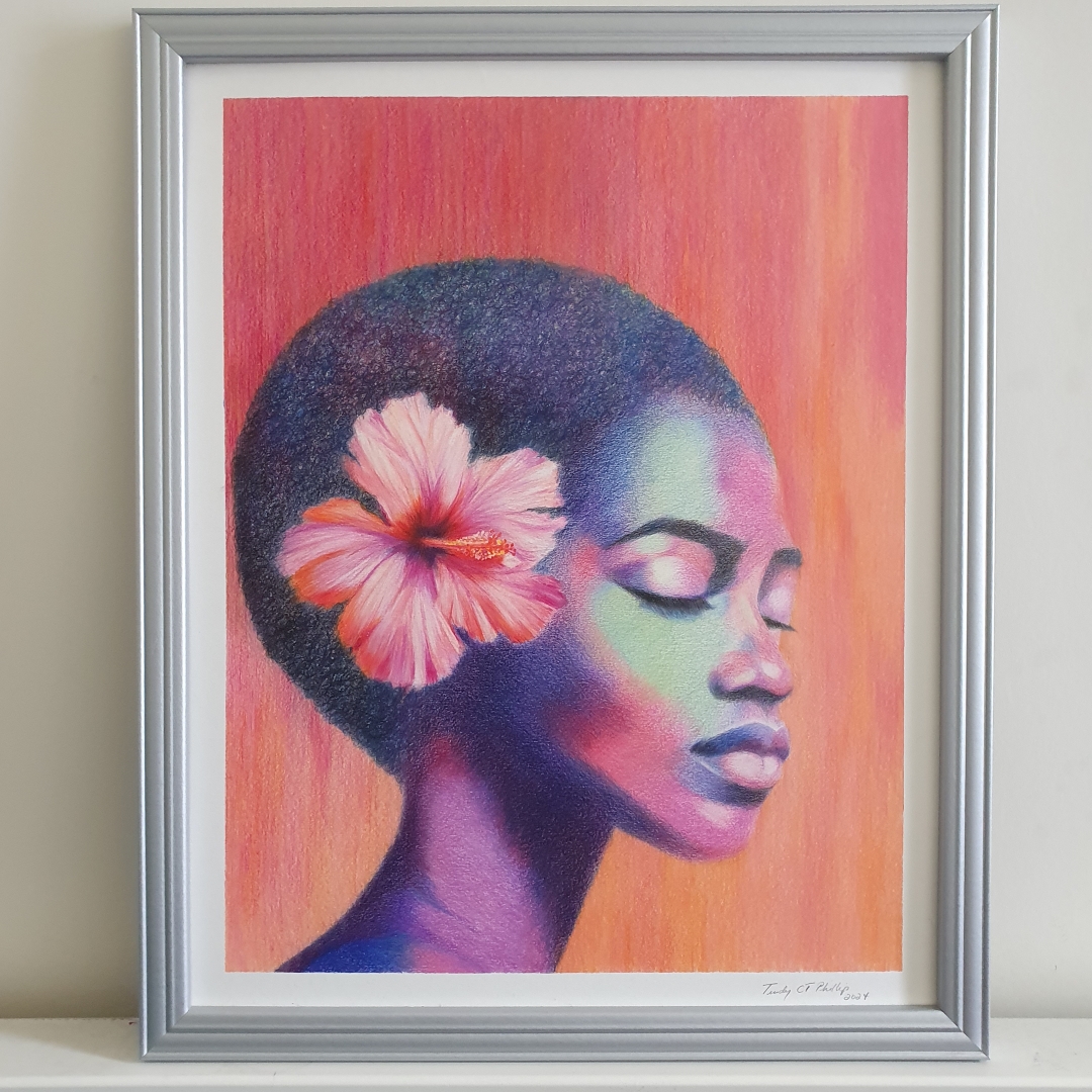 The colour pencil portrait entitled Aura features a side profile of a serene woman with her eyes gently closed, exuding calm and introspection. Her skin is shaded with a stunning array of blues, purples, and soft greens, creating a radiant, almost otherworldly effect. A large, vibrant pink hibiscus flower is tucked behind her ear, adding a touch of natural beauty and symbolising tranquillity or femininity. The background is a warm gradient of orange and pink tones, which contrasts beautifully with the cooler hues of her face and neck, enhancing the dreamlike atmosphere.
The woman’s short, textured hair fades seamlessly into the background, allowing her graceful facial features and the vivid flower to stand out. The soft blending of colours on her skin and the smooth transitions between light and shadow demonstrate the artist’s mastery of colour pencil techniques. Signed in 2024, Aura conveys an ethereal, peaceful energy, inviting the viewer to share in its sense of stillness and inner reflection.